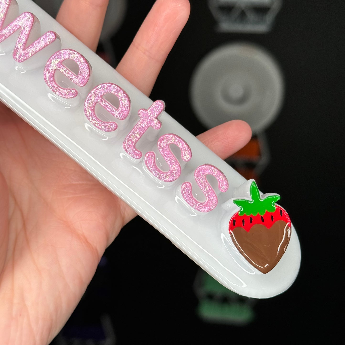 White nameplate with Strawberry #50